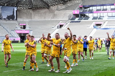050426 - Stade Francais v Dragons RFC - EPCR Challenge Cup Round of 16 - Dragons players applaud the travelling fans