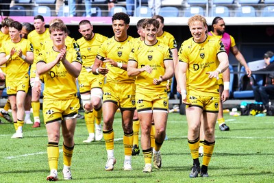 050426 - Stade Francais v Dragons RFC - EPCR Challenge Cup Round of 16 - Dragons players applaud the travelling fans