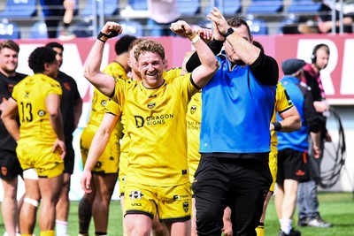 050426 - Stade Francais v Dragons RFC - EPCR Challenge Cup Round of 16 - Angus O'Brien of Dragons applauds the travelling fans