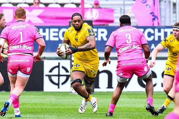 050426 - Stade Francais v Dragons RFC - EPCR Challenge Cup Round of 16 - Levi Douglas of Dragons takes on Jack Iscaro and Yanis Lux of Stade Francais 