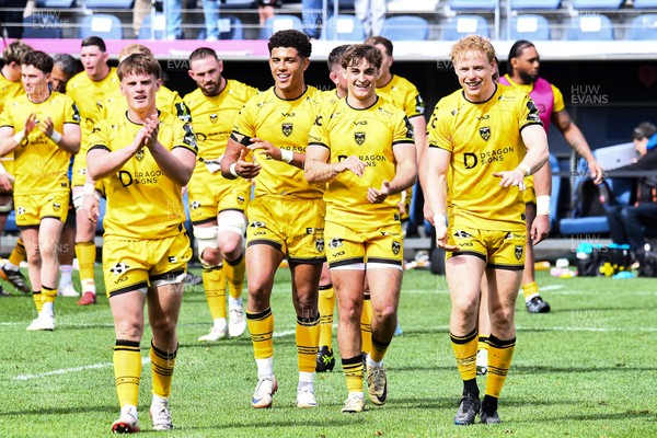050426 - Stade Francais v Dragons RFC - EPCR Challenge Cup Round of 16 - Dragons players applaud the travelling fans