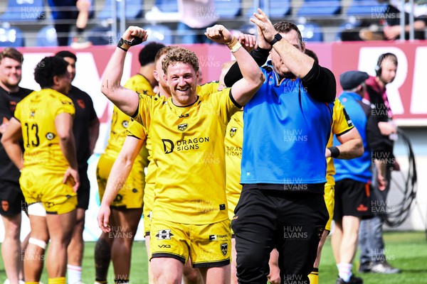 050426 - Stade Francais v Dragons RFC - EPCR Challenge Cup Round of 16 - Angus O'Brien of Dragons applauds the travelling fans