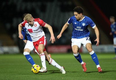 091225 - Stevenage FC v Cardiff City - SkyBet League One - Saxon Earley of Stevenage is challenged by Yousef Salech of Cardiff 