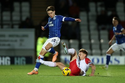 091225 - Stevenage FC v Cardiff City - SkyBet League One - Cian Ashford of Cardiff is tackled by Carl Piergianni of Stevenage 