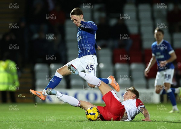 091225 - Stevenage FC v Cardiff City - SkyBet League One - Cian Ashford of Cardiff is tackled by Carl Piergianni of Stevenage 