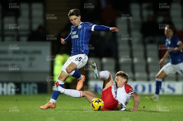 091225 - Stevenage FC v Cardiff City - SkyBet League One - Cian Ashford of Cardiff is tackled by Carl Piergianni of Stevenage 