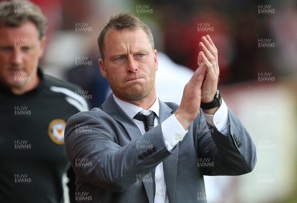 050817 - Stevenage v Newport County, Sky Bet League 2 - Newport County manager Mike Flynn applauds the travelling supporters at the start of the match