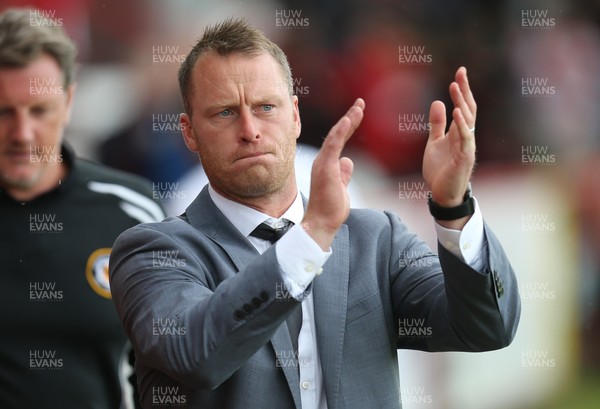 050817 - Stevenage v Newport County, Sky Bet League 2 - Newport County manager Mike Flynn applauds the travelling supporters at the start of the match