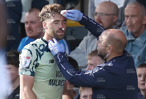 130925 - Stockport County v Cardiff City - Sky Bet League 1 - Calum Chambers of Cardiff with an injured nose