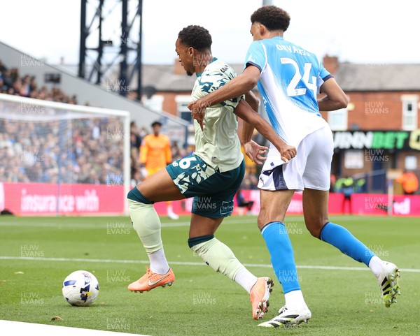 130925 - Stockport County v Cardiff City - Sky Bet League 1 - Chris Willock of Cardiff and Tyler Onyango of Stockport