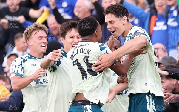 130925 - Stockport County v Cardiff City - Sky Bet League 1 - Yousef Saleh of Cardiff celebrates last minute equaliser with Chris Willock of Cardiff and Rubin Colwill of Cardiff