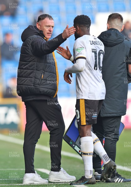090324 - Stockport County v Newport County - Sky Bet League 2 - Manager Graham Coughlan of Newport County takes off Offrande Zanzala of Newport County after half time