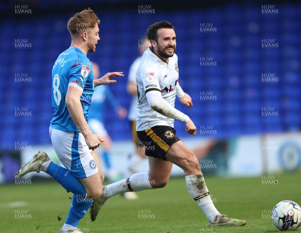 090324 - Stockport County v Newport County - Sky Bet League 2 - Aaron Wildig of Newport County and Callum Camps of Stockport County