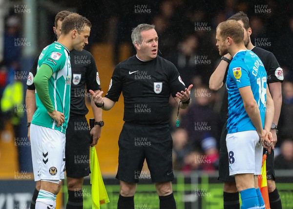100423 - Stockport County v Newport County - Sky Bet League 2 - Referee Carl Brook talks to both captains before kick off