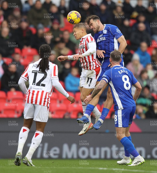 041123 - Stoke City v Cardiff City - Sky Bet Championship - Demitrios Goutas of Cardiff and Dwight Gayle of Stoke City