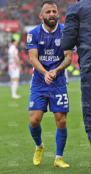 041123 - Stoke City v Cardiff City - Sky Bet Championship - Manolis Siopis of Cardiff with right hand injury gets treatment