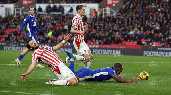 041123 - Stoke City v Cardiff City - Sky Bet Championship - Yakou Meite of Cardiff is brought down in the box by Ben Pearson of Stoke City but no foul or penalty given