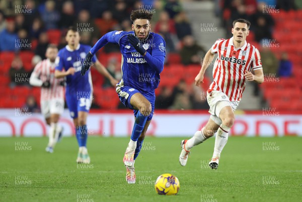 041123 - Stoke City v Cardiff City - Sky Bet Championship - Kion Etete of Cardiff races for the ball