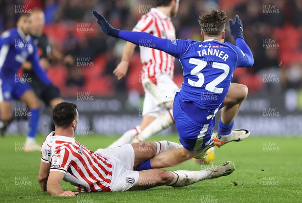 041123 - Stoke City v Cardiff City - Sky Bet Championship - Ollie Tanner of Cardiff is brought down by Enda Stevens of Stoke City