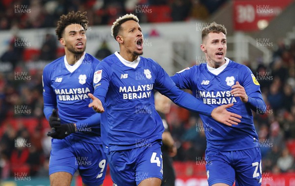 101222 - Stoke City v Cardiff City - Sky Bet Championship - Callum Robinson of Cardiff celebrates scoring a goal with Kion Etete of Cardiff and Gavin Whyte of Cardiff