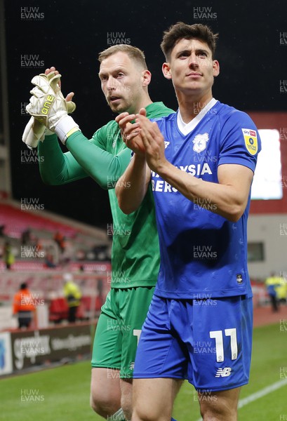 101222 - Stoke City v Cardiff City - Sky Bet Championship - Goalkeeper Ryan Allsop of Cardiff and Callum O'Dowda of Cardiff applaud the fans at the end of the match