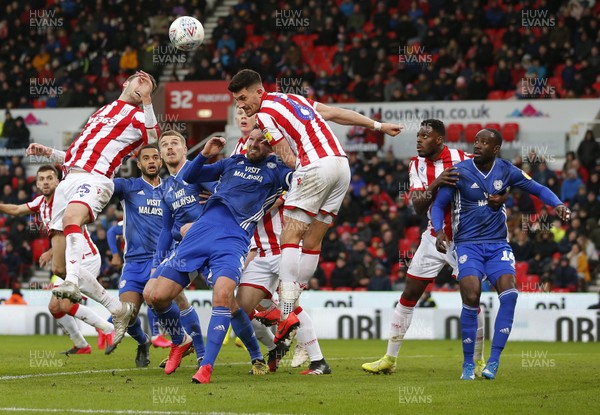 220220 - Stoke City v Cardiff City - Sky Bet Championship - Sean Morrison of Cardiff is pulled back by Danny Batth of Stoke City as he tries to convert a corner   