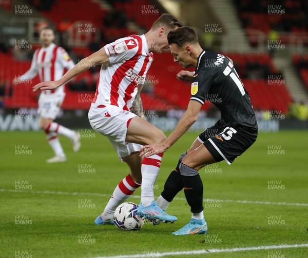080222 - Stoke City v Swansea City - Sky Bet Championship - Hannes Wolf of Swansea tries a shot on goal but blocked by Ben Wilmot of Stoke City