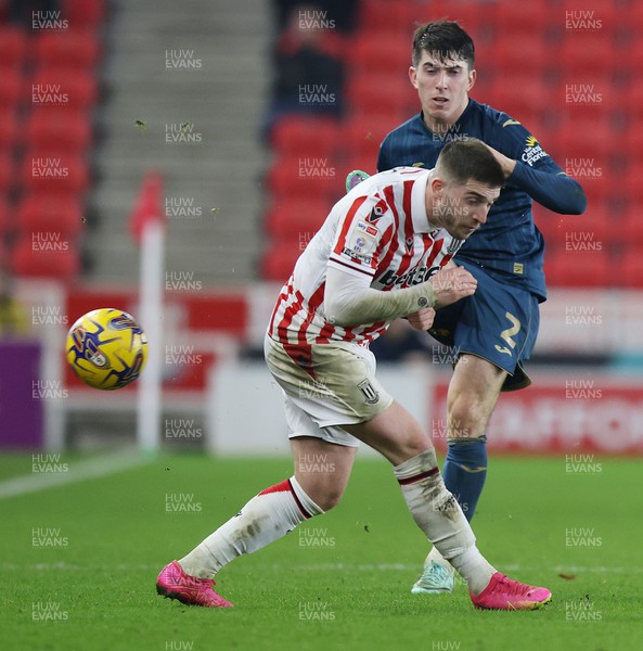 121223 - Stoke City v Swansea City - Sky Bet Championship - Lynden Gooch of Stoke City and Joshua Key  of Swansea compete for the ball