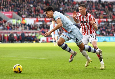 131225 - Stoke City v Swansea City - Sky Bet Championship - Marko Stamenic of Swansea and Robert Bozenik of Stoke