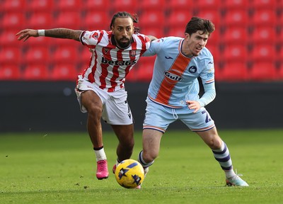 131225 - Stoke City v Swansea City - Sky Bet Championship - Joshua Key of Swansea and Sorba Thomas of Stoke