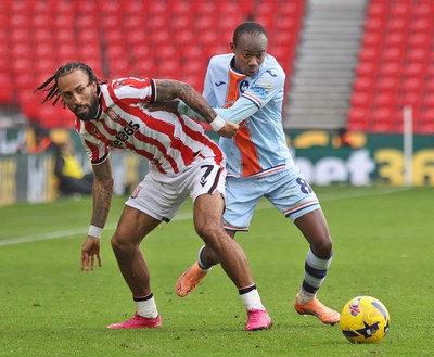 131225 - Stoke City v Swansea City - Sky Bet Championship - Malick Yalcouye of Swansea and Sorba Thomas of Stoke