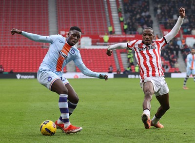 131225 - Stoke City v Swansea City - Sky Bet Championship - Zeidane Inoussa of Swansea and Eric Boca of Stoke