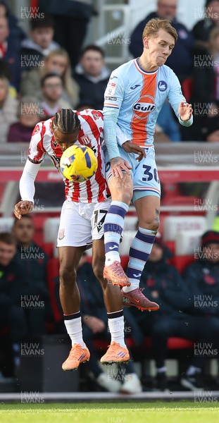 131225 - Stoke City v Swansea City - Sky Bet Championship - Ethan Galbraith of Swansea and Eric Boca of Stoke
