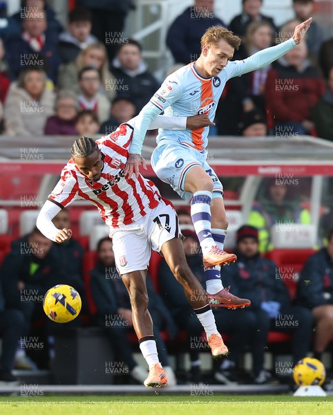 131225 - Stoke City v Swansea City - Sky Bet Championship - Ethan Galbraith of Swansea and Eric Boca of Stoke