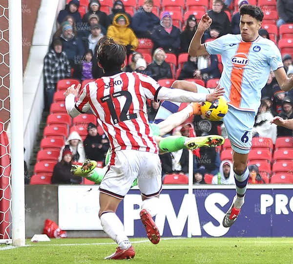 131225 - Stoke City v Swansea City - Sky Bet Championship - Goalkeeper Viktor Johansson of Stoke  makes a spectacular save from Marko Stamenic of Swansea in the 1st half with Tatsuki Seko of Stoke back up