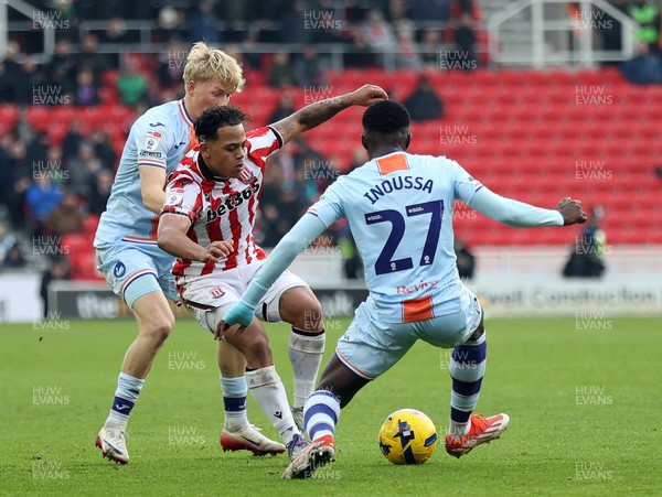 131225 - Stoke City v Swansea City - Sky Bet Championship - Melker Widell of Swansea and Million Manhoef of Stoke and Zeidane Inoussa of Swansea