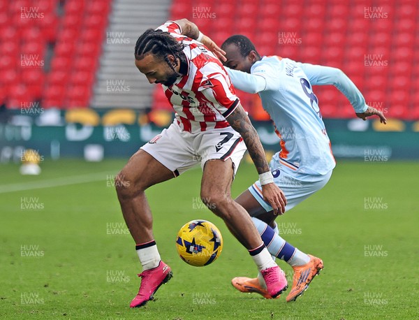 131225 - Stoke City v Swansea City - Sky Bet Championship - Malick Yalcouye of Swansea and Sorba Thomas of Stoke