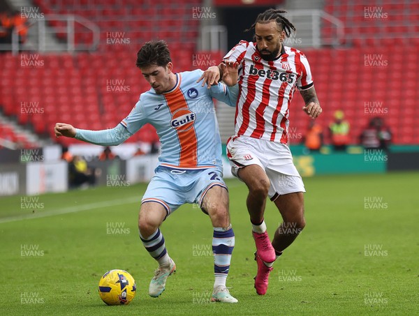 131225 - Stoke City v Swansea City - Sky Bet Championship - Joshua Key of Swansea and Sorba Thomas of Stoke