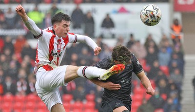 150225 - Stoke City v Swansea City - Sky Bet Championship - Goncalo Franco of Swansea and Andrew Moran of Stoke City clash in 1st half