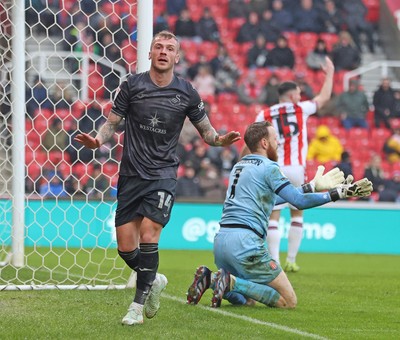 150225 - Stoke City v Swansea City - Sky Bet Championship - Josh Tymon of Swansea celebrates scoring the first goal of the match