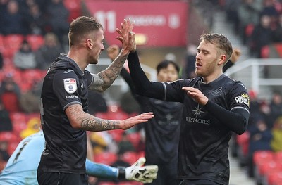 150225 - Stoke City v Swansea City - Sky Bet Championship - Josh Tymon of Swansea celebrates scoring the first goal of the match with Oli Cooper of Swansea