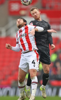 150225 - Stoke City v Swansea City - Sky Bet Championship - Lewis O'Brien of Swansea and Ben Pearson of Stoke City