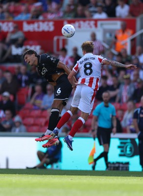 150826 - Stoke City v Swansea City, EFL Sky Bet Championship - Marko Stamenic of Swansea City and Ethan Galbraith of Stoke City compete for the ball