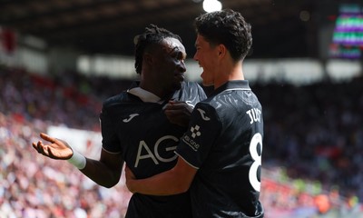 150826 - Stoke City v Swansea City, EFL Sky Bet Championship - Joseph Opoku of Swansea City celebrates with Elijah Just of Swansea City after scoring the first goal