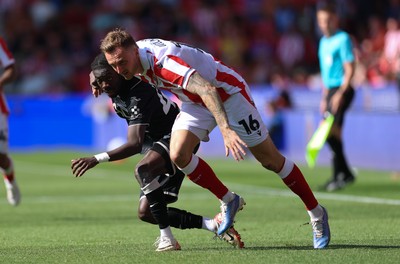 150826 - Stoke City v Swansea City, EFL Sky Bet Championship - Moussa Yeo of Swansea City is challenged by Ben Wilmot of Stoke City