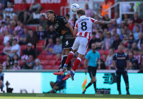 150826 - Stoke City v Swansea City, EFL Sky Bet Championship - Marko Stamenic of Swansea City and Ethan Galbraith of Stoke City compete for the ball