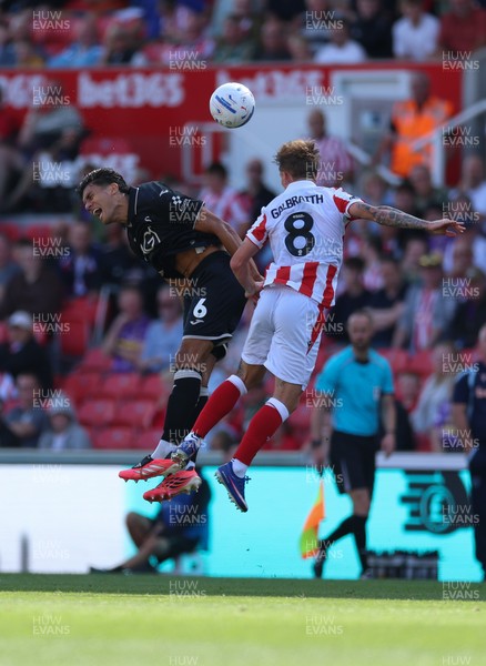 150826 - Stoke City v Swansea City, EFL Sky Bet Championship - Marko Stamenic of Swansea City and Ethan Galbraith of Stoke City compete for the ball