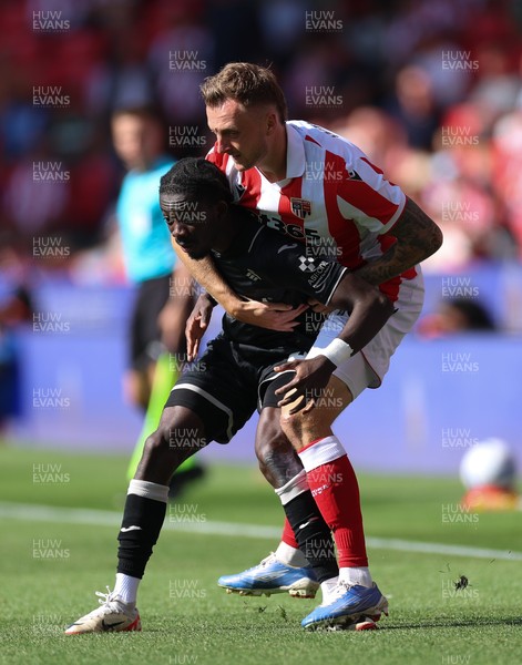150826 - Stoke City v Swansea City, EFL Sky Bet Championship - Moussa Yeo of Swansea City is challenged by Ben Wilmot of Stoke City