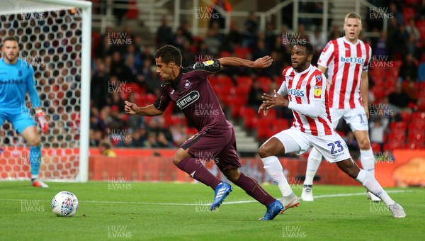 180918 - Stoke City v Swansea City - SkyBet Championship - Wayne Routledge of Swansea City tries to get the ball into the box