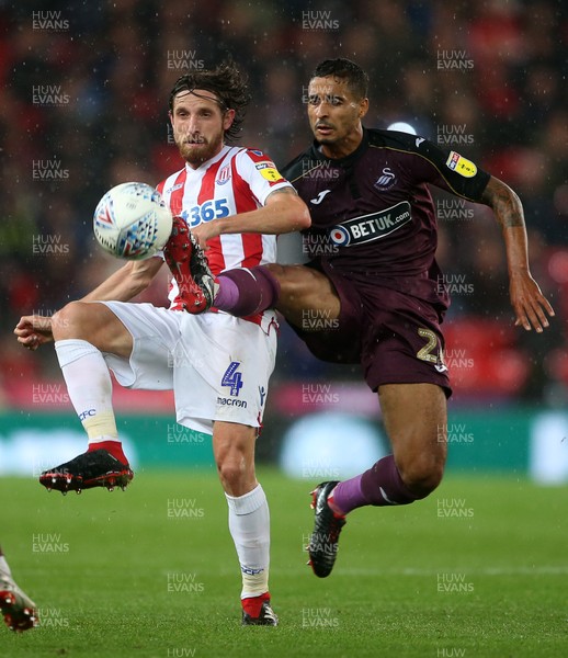 180918 - Stoke City v Swansea City - SkyBet Championship - Joe Allen of Stoke City is challenged by Kyle Naughton of Swansea City